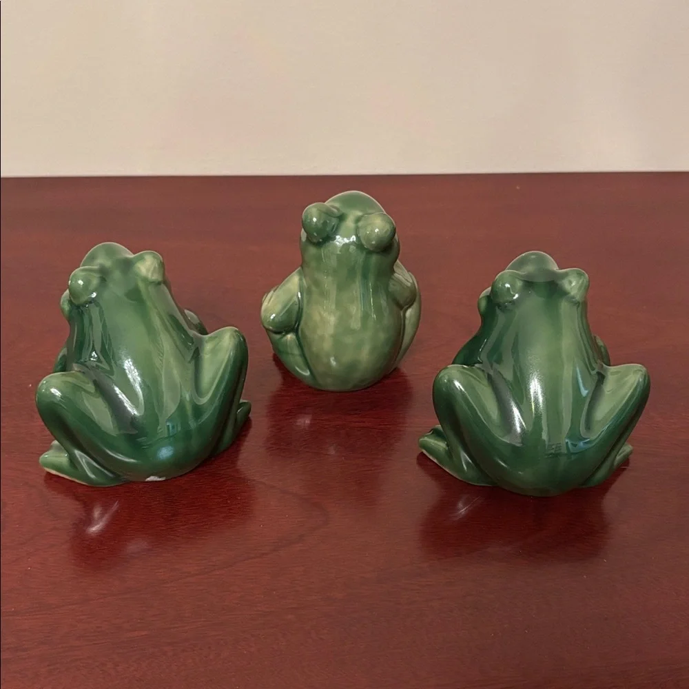 Set of three smooth ceramic green frog figurines